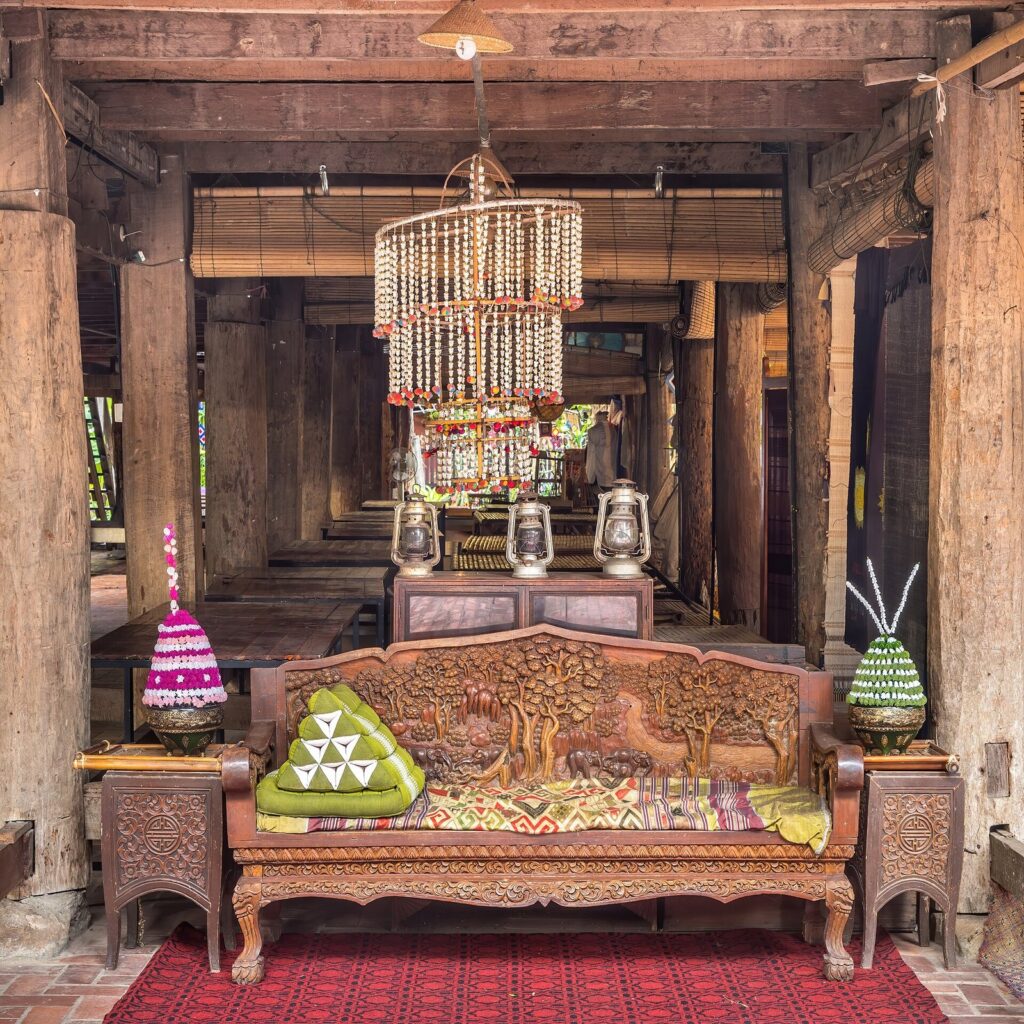 Bench — Carved wooden bench, furniture, textile crafts, lanterns and suspended mobile sculptures, 