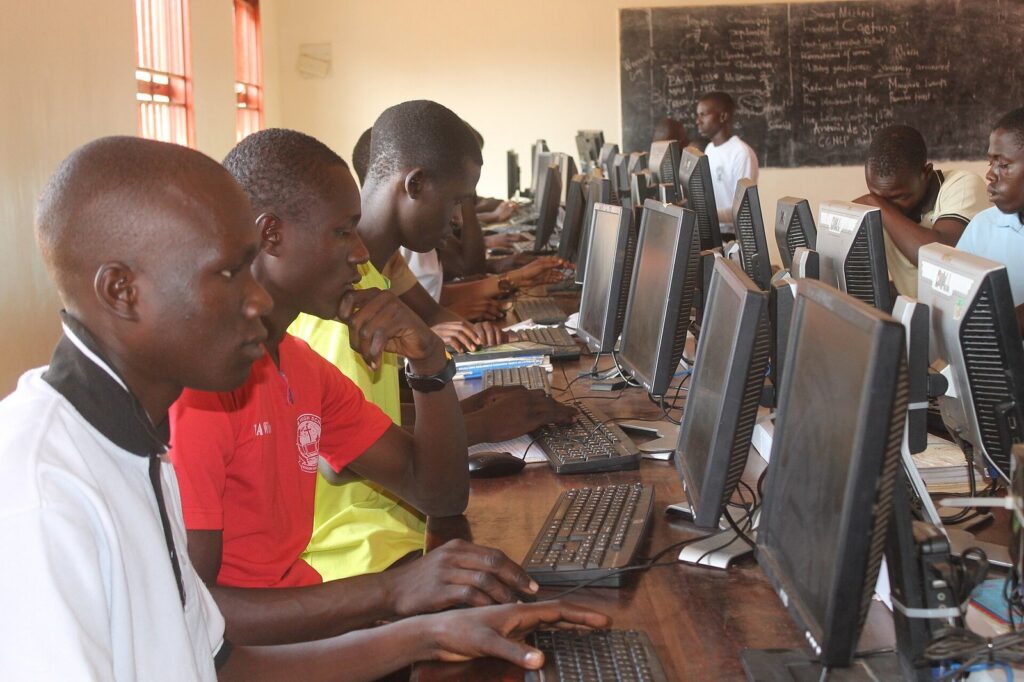 ICT — Students learning using computers at Wisdom High School Akalo