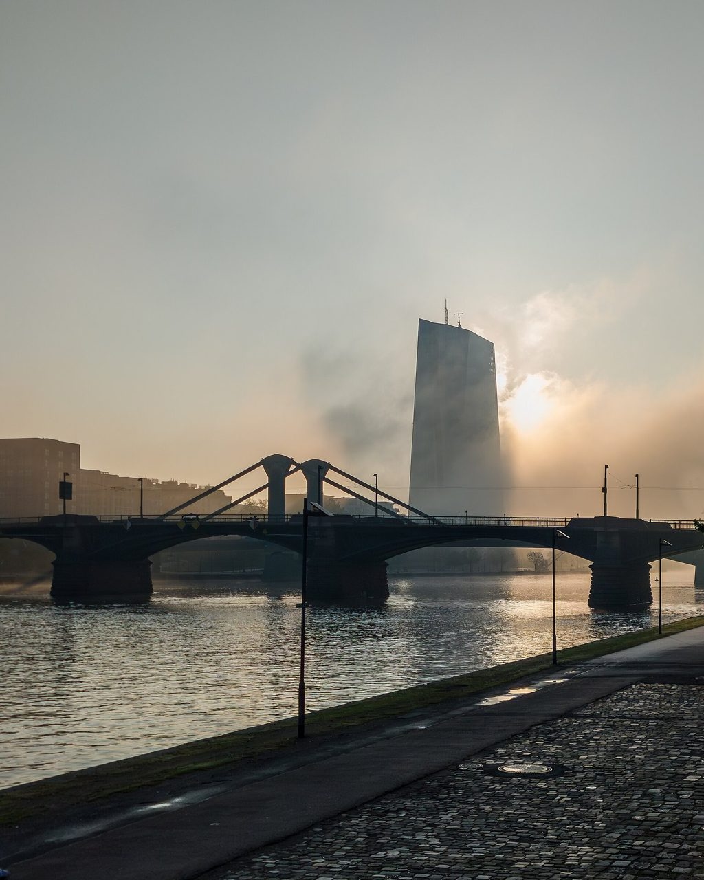 ECB — Contre-jour view of ECB tower in the morning fog shortly after sunrise